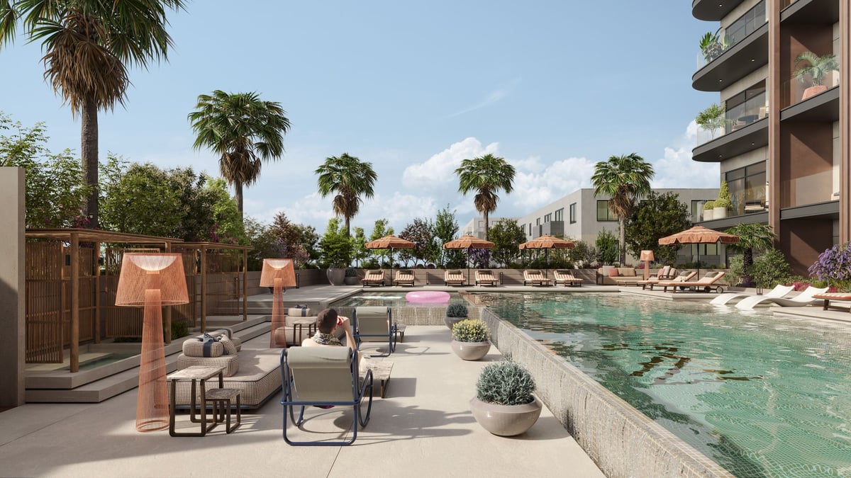 Almaan 101 — Planting and changes in level separate quieter seating from the main pool deck.
