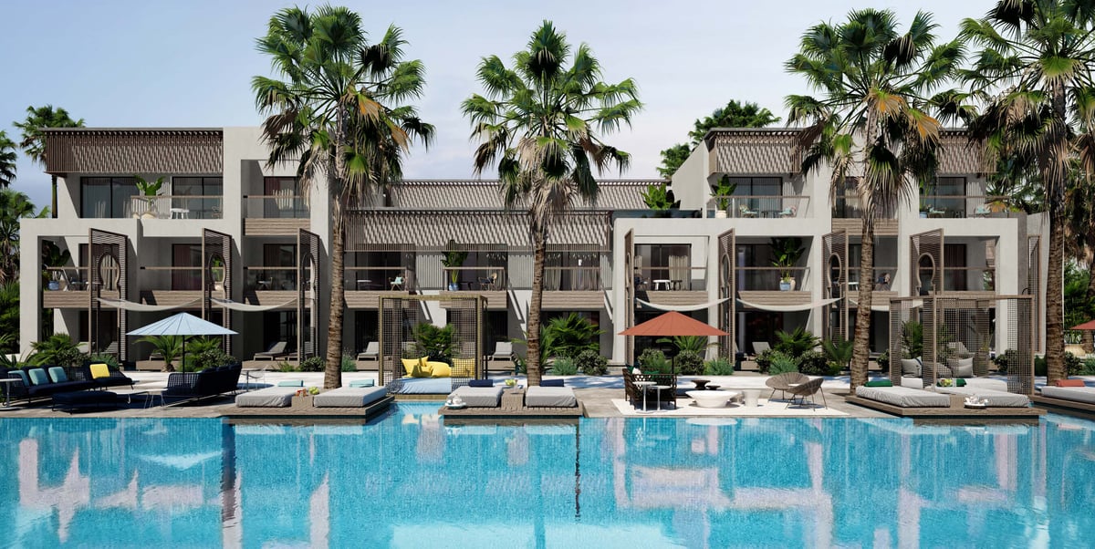 Costa Mares — Repeated balcony bays give individual rooms an outdoor address along the shared pool.