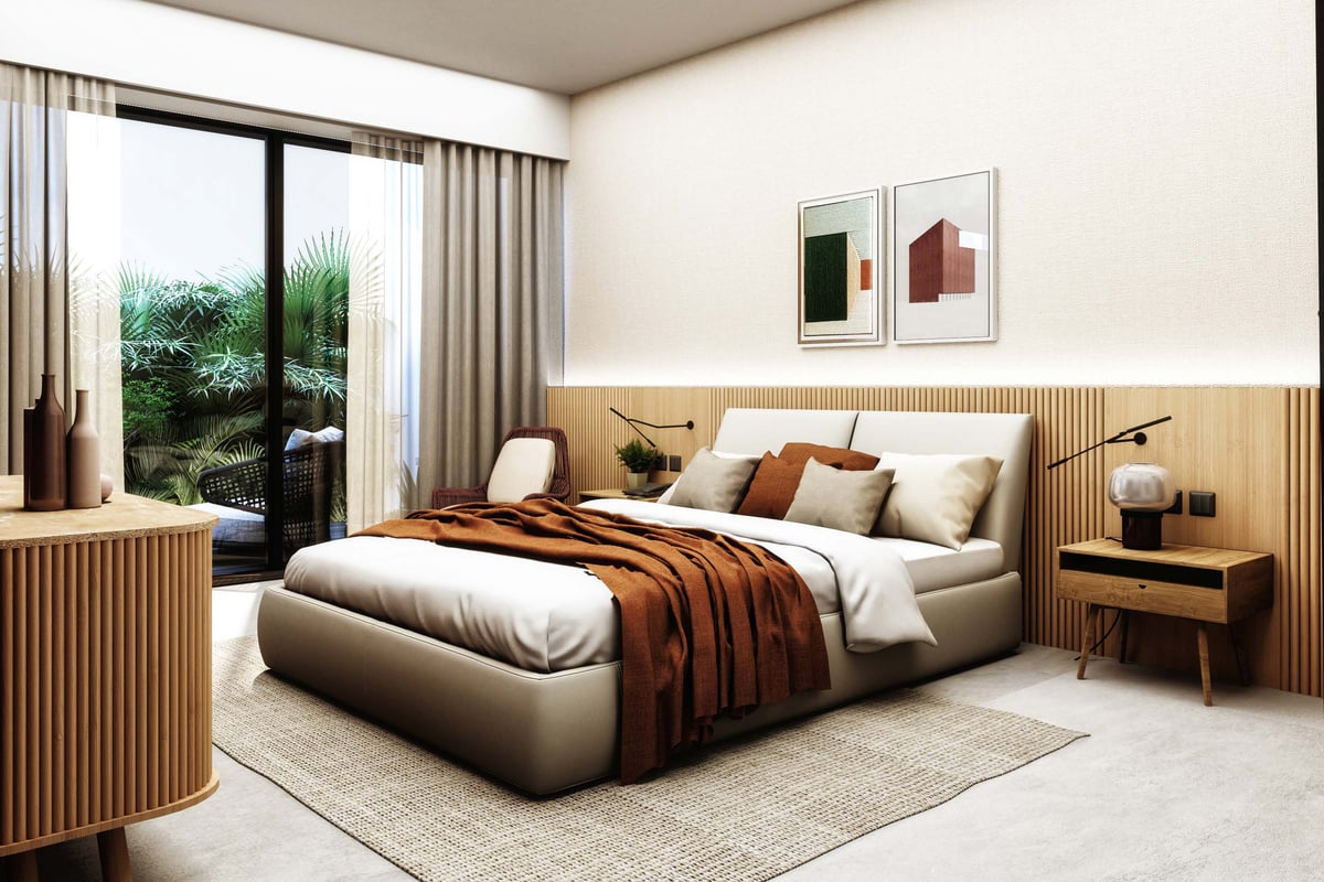 Costa Mares — The bedroom opens directly towards planting, giving the terrace a role in the room's daily use.