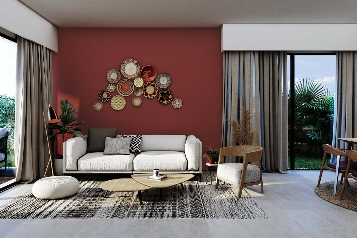 Costa Mares — Terracotta colour distinguishes the villa lounge within the otherwise restrained material palette.