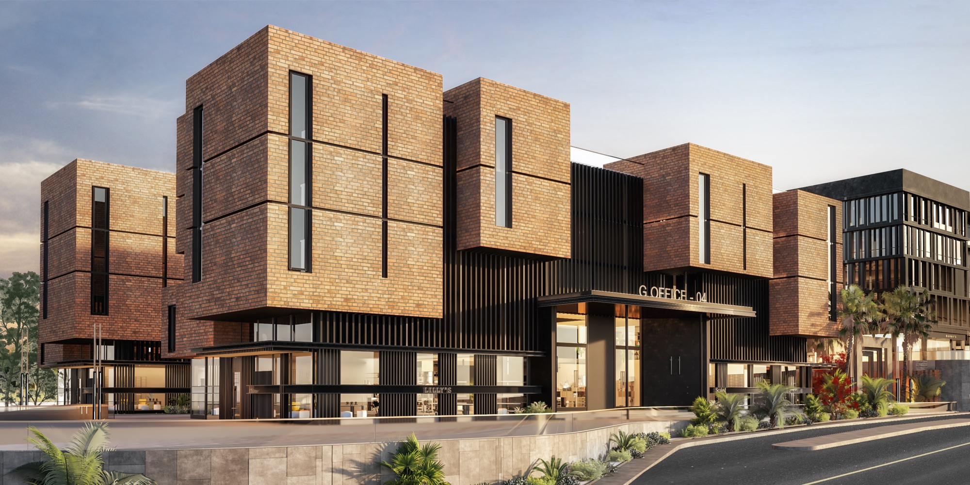 G-Town Offices — Stacked brick volumes over the glazed showroom — the G-Office entrance