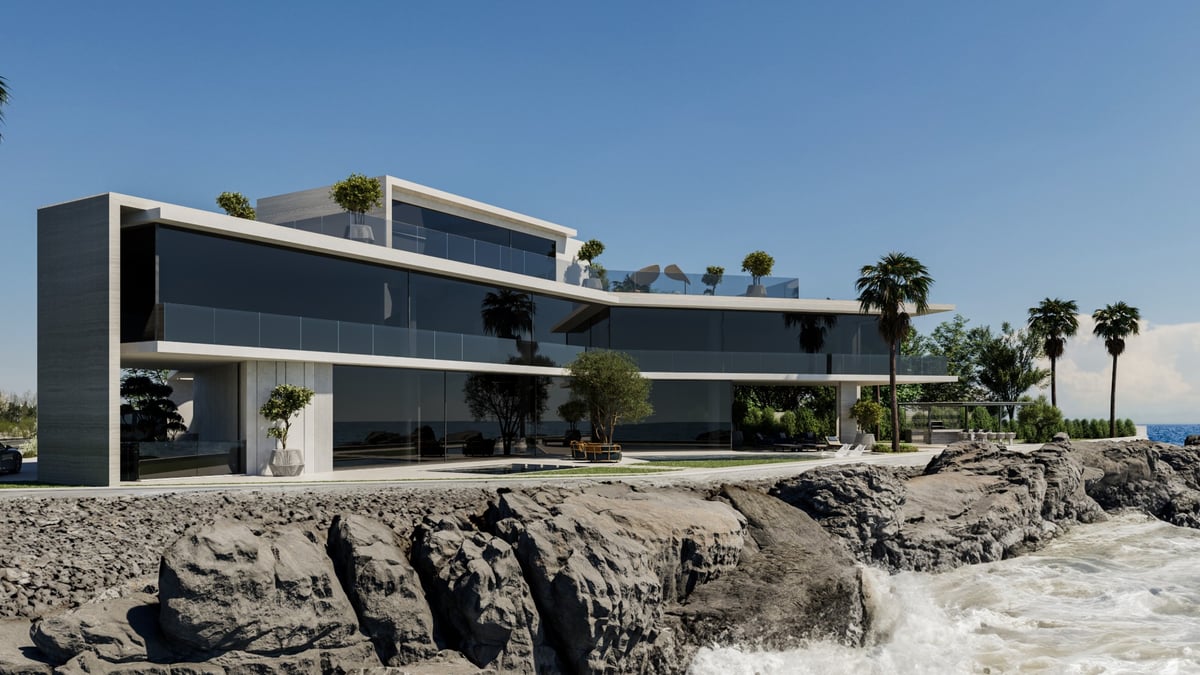 La Mer C1 — The house is pulled back from the rocks far enough to let the sea take the foreground.