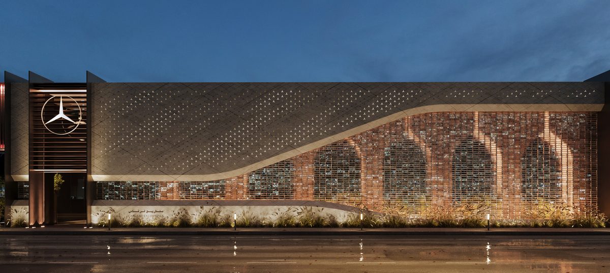 Mercedes-Benz Majlis & GAC Showroom — Backlighting reveals the permeability of the brick screen while retaining the outline of the arches.