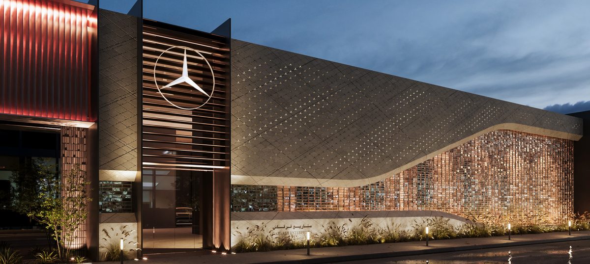 Mercedes-Benz Majlis & GAC Showroom — Lighting reinforces the entrance tower as the point of arrival between the two buildings.