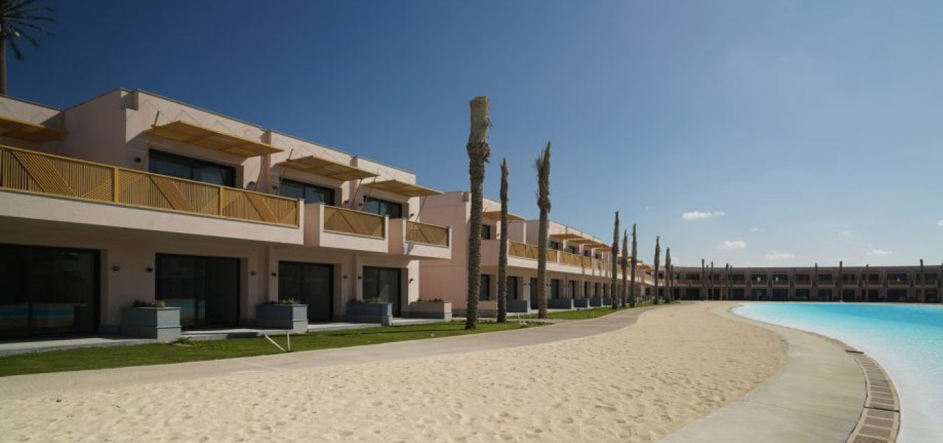 Playa — Photograph — the row along the beach