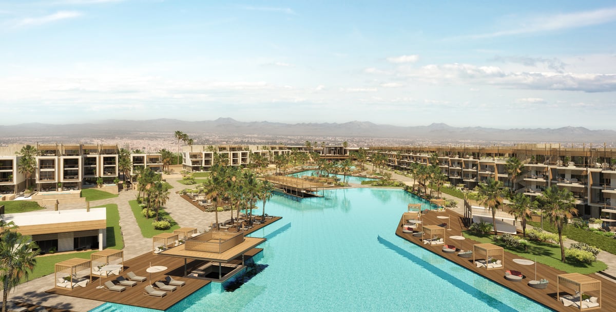 Rixos Magawish — The lagoon establishes the resort's main axis, linking the arrival building with the sea.