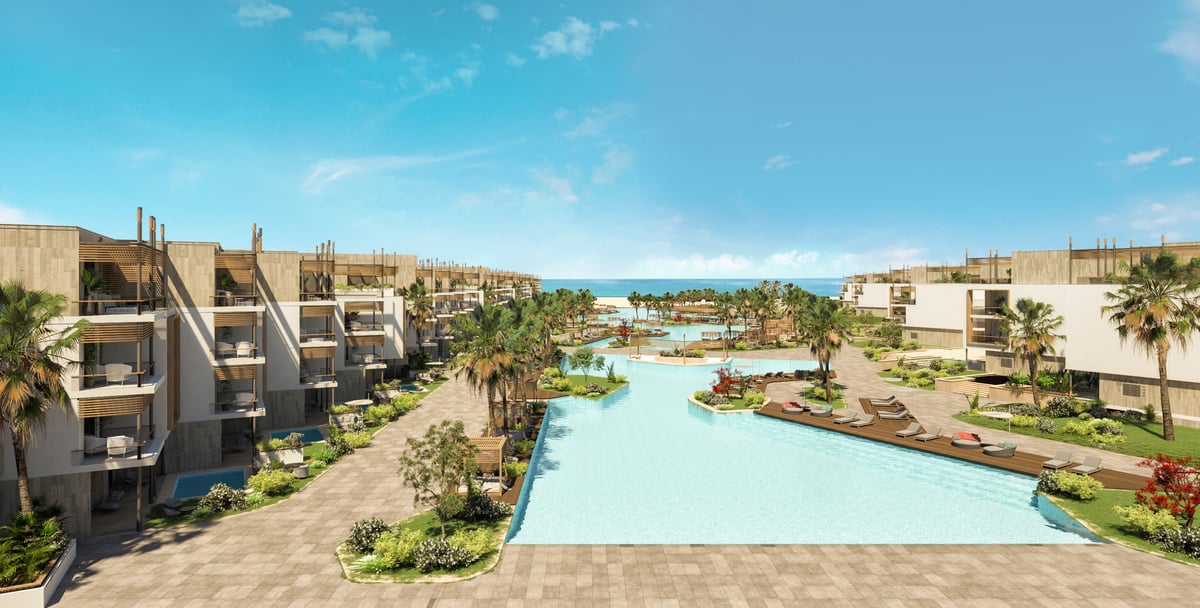 Rixos Magawish — Guest wings follow the lagoon, giving the landscape a clear route through the resort.