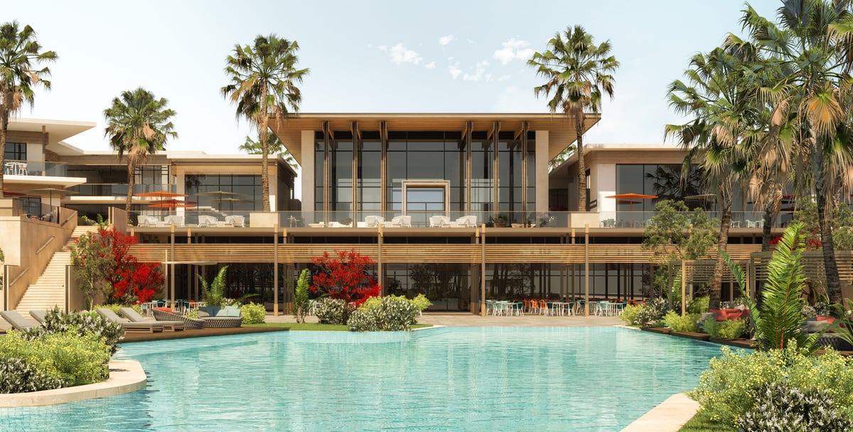 Rixos Magawish — The main building opens onto the water through a deep, two-storey terrace.