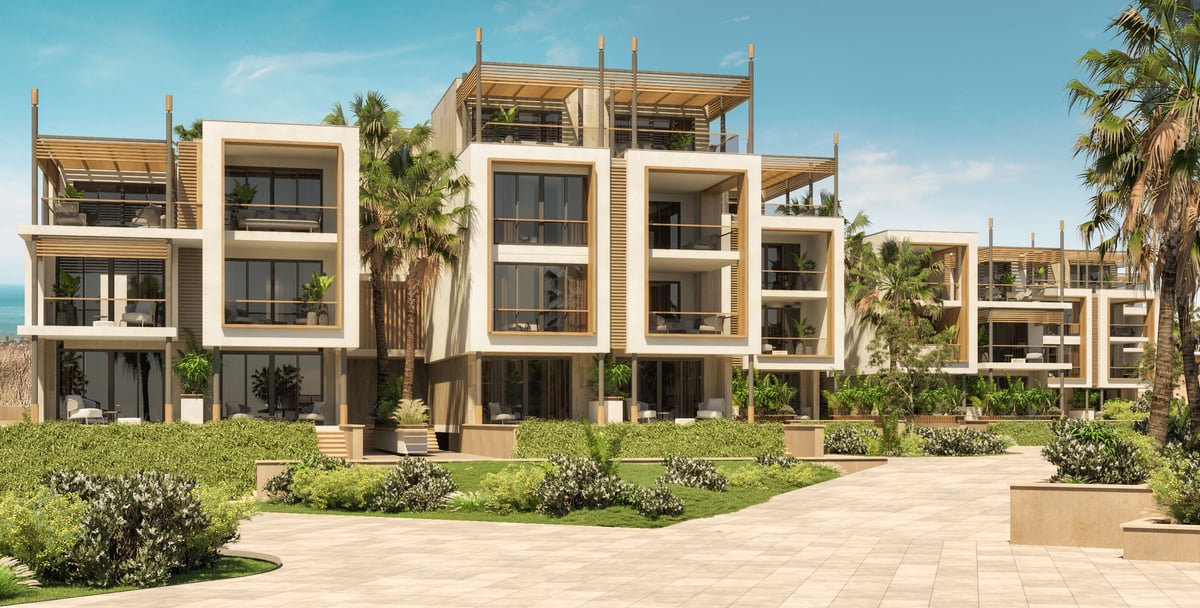 Rixos Magawish — Deep balcony frames give the repeated guest rooms a distinct outdoor space.