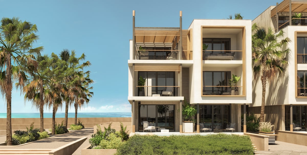 Rixos Magawish — At the end of each wing, the balcony frame turns the corner towards the sea.