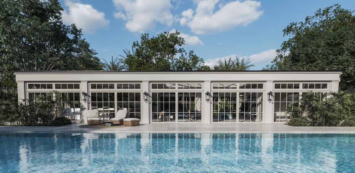 SS Residence — Full-height glazing lets the poolhouse remain visually connected to the water.