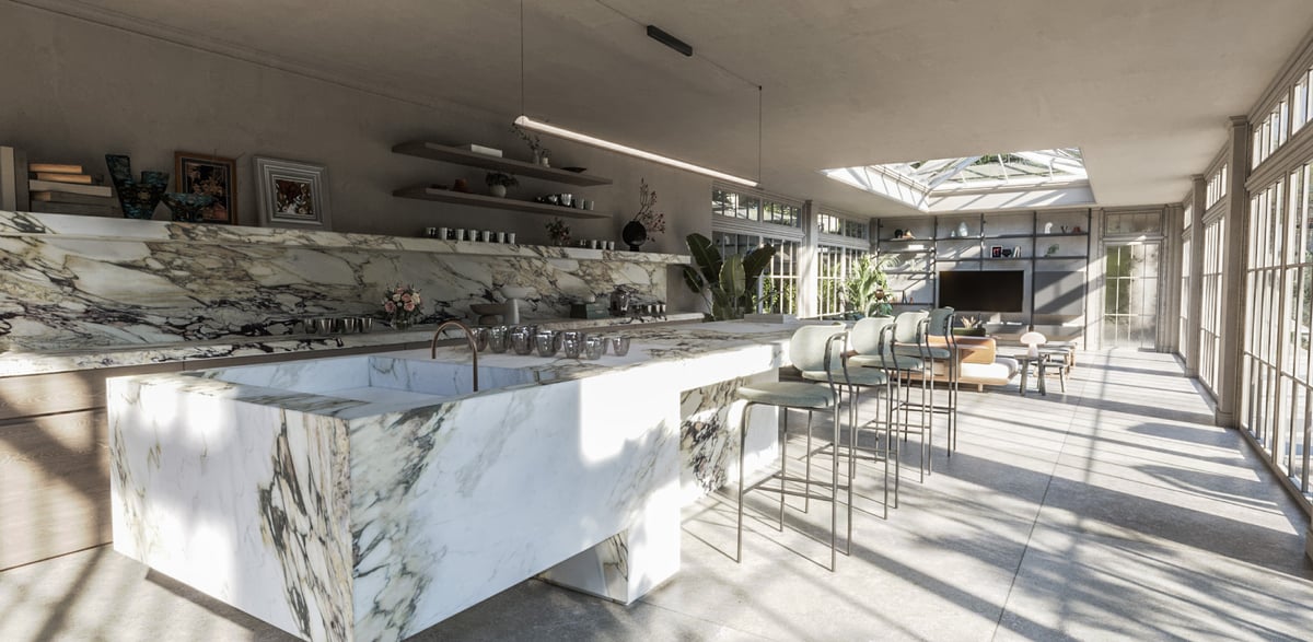 SS Residence — The long kitchen island supports informal dining as part of the poolhouse's shared living space.