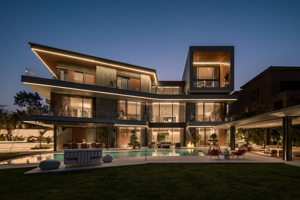 The Continuum House — Garden front at dusk from the lawn