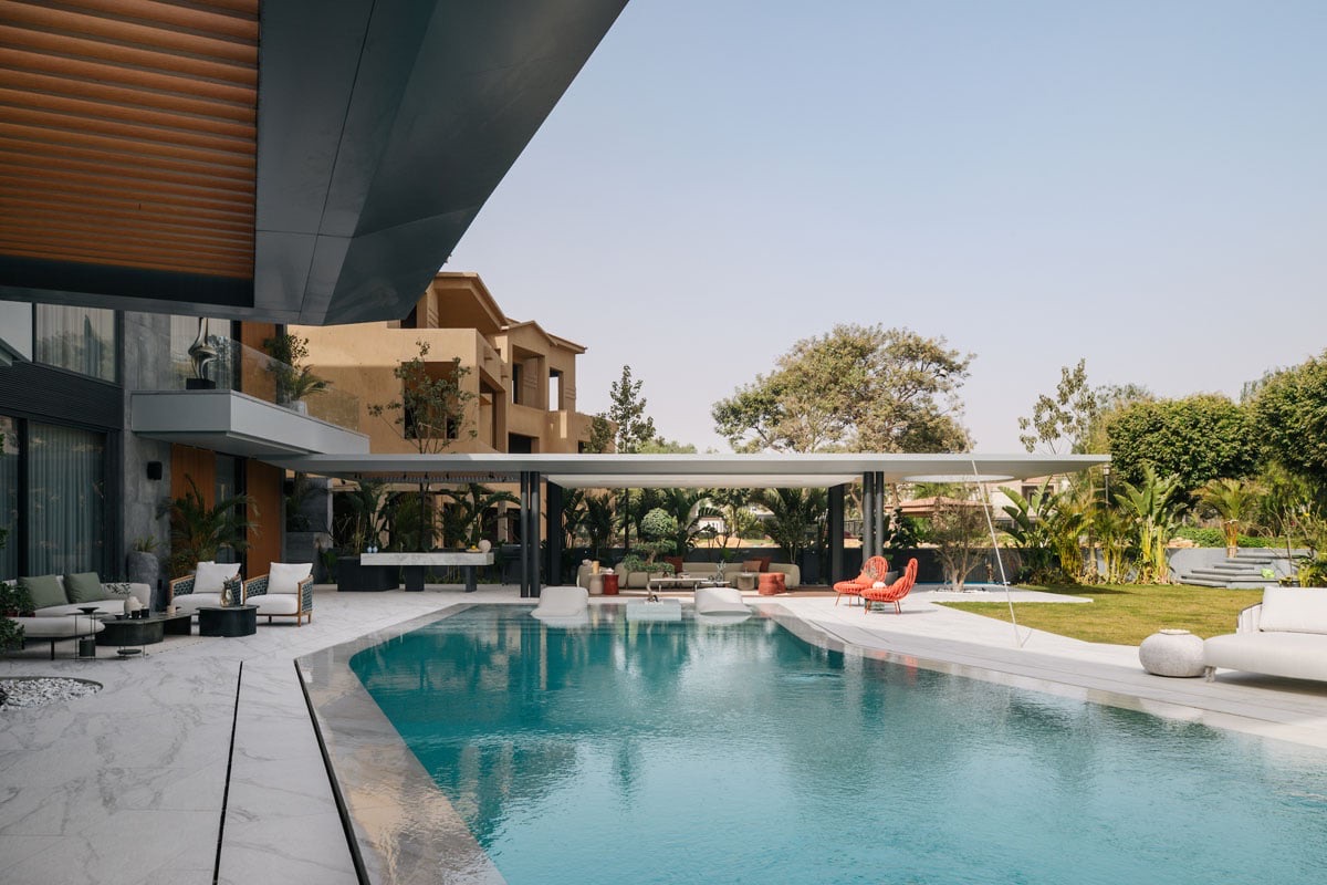 The Continuum House — Pool terrace towards the pergola