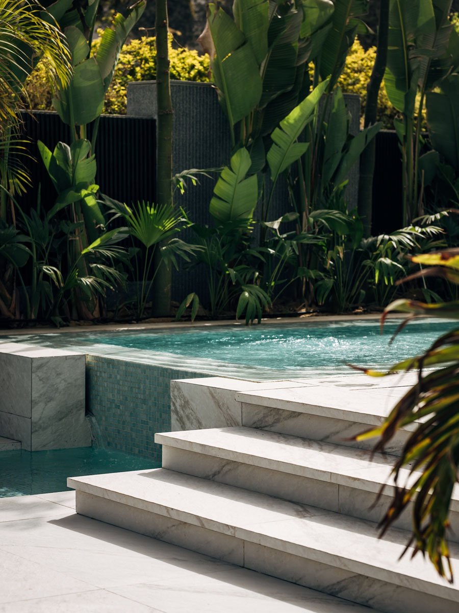 The Continuum House — Terrace lounge beneath the overhang